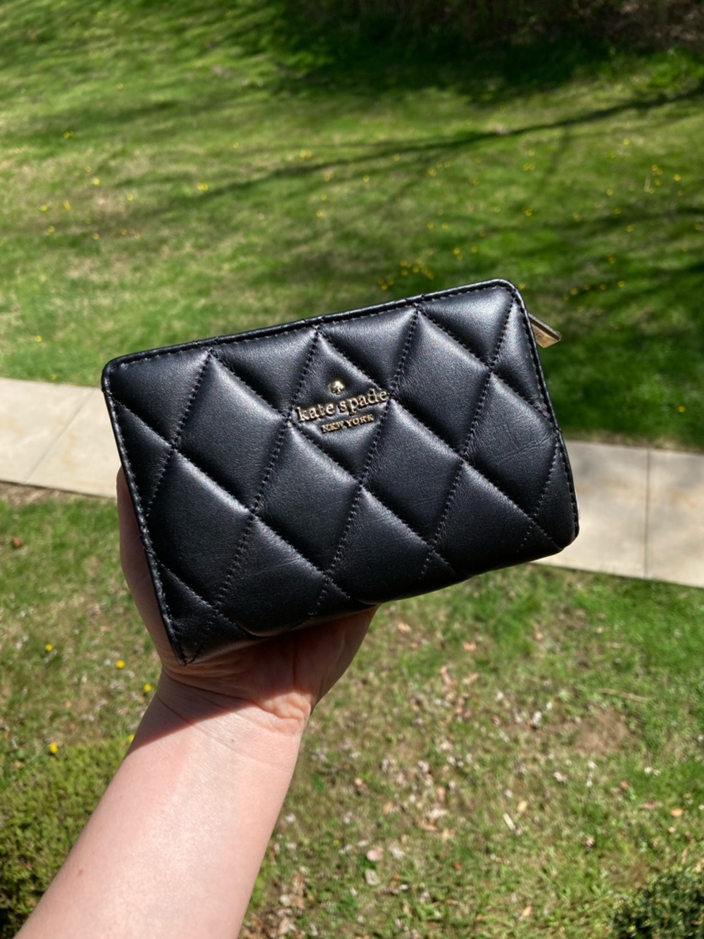 Kate Spade New York Carey Medium Compact Bifold Wallet in Black Quilted Leather